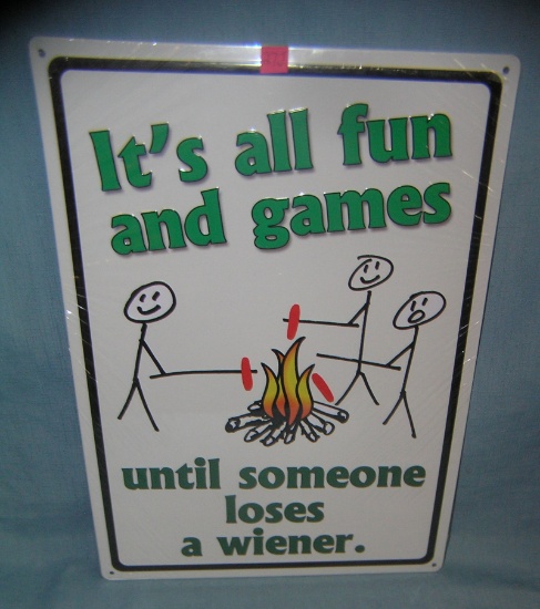 Tin fun and games until some one loses a weiner sign