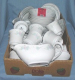Box of floral decorated dinnerware by China Garden