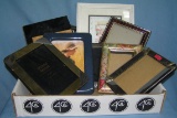 Box full of vintage and modern picture frames