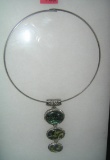 Costume jewelry necklace with abalone type stone