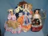 Box full of collectible dolls and more