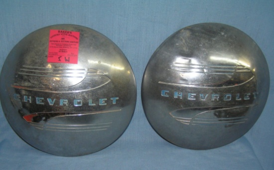 Pair of antique Chevrolet hub caps ca. 1930