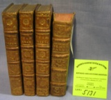 Group of four antique leather bound books