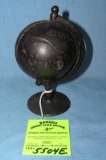 Early cast iron globe bank