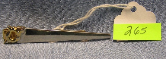Vintage carpenters saw shaped tie clasp
