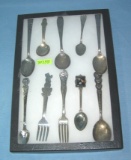 Collection of character and souvenir spoons