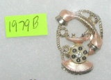Telephone shaped pin with semi precious stone