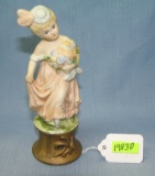 Hand painted porcelain flower girl figurine