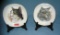 Pair of cat decorated dishes with stands