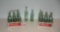 Collection of Coca Cola bottles and 2 early carriers