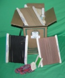Box full of vintage sewing and knitting accessories