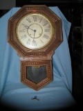 Antique wall clock by Wm L Gilbert Clock Co