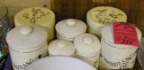 Group of vintage canisters and serving tray
