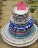 Large group of vintage serving plates and bowls