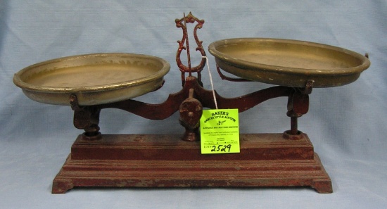 Antique cast iron scale with dual brass bins