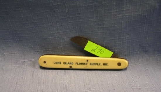 Antique celluloid advertising pocket knife