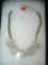 Necklace with pearl floral style decorations