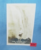 Man over Niagara Falls in a rubber ball post card