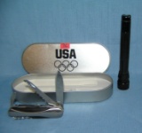 Maglite style flash light and US olympic pocket knife