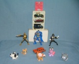 Collection of vintage toys featuring Batman and more