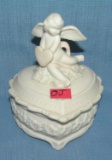 Porcelain heart shaped musical trinket box with Cherub