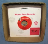 Box of vintage 45 RPM records