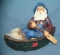 Hand painted fisherman in rowboat figurine