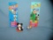Group of vintage Disney PEZ candy containers and toys