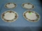 Group of 4 holiday decorated serving plates