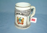 Multiple crest decorative beer stein