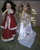 Pair of mechanical and animated holiday angels