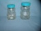 Pair of Skippy figural bear shaped storage jars