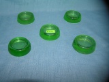 Group of 5 green Depression glass furniture coasters