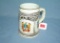 Multiple crest decorative beer stein