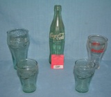 Group of Coca Cola collectibles