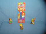 Group of vintage Simpsons PEZ collectible candy containers