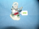 Colorized glass child figure with snowball