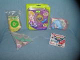 Group of vintage toys includes Polly Pocket play set