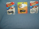 Group of all cast metal vehicles mint on card