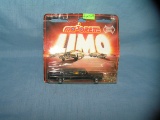 Vintage cast metal stretch limo toy mint on card