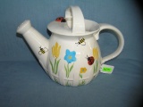 Floral bumble bee and beetle decorated watering can