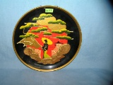 Oriental themed hand painted and hand decorated wall plate