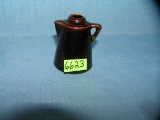 Antique coffee pot figurine