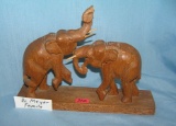 Hand carved elephant's at play wooden figural display piece