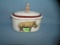 Rhino and monkey decorated covered bowl
