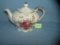 Floral decorated porcelain musical teapot