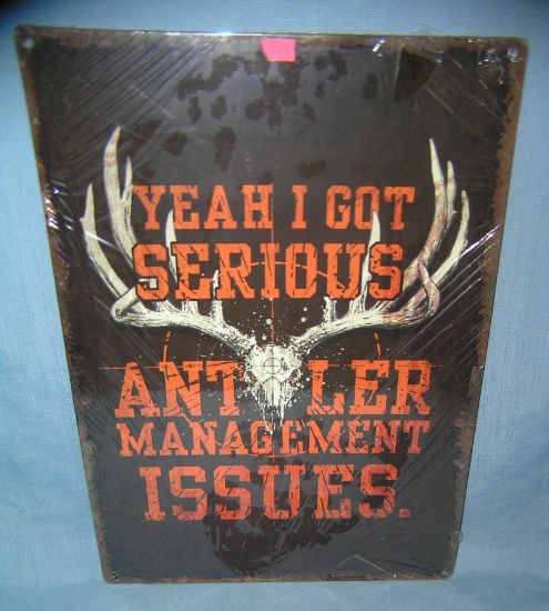 All tin Antler management issues advertising sign