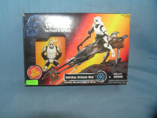 Star Wars action figure and Imperial Speeder bike