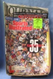 Box of vintage sports collectibles