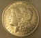 1921 Morgan silver dollar in AU condition